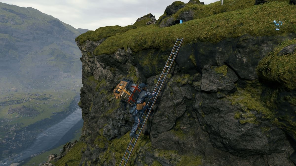 a man in a futuristic spacesuit wearing a delivery backpack, Sam Bridges, climbs a ladder leaning against a cliff in Death Stranding