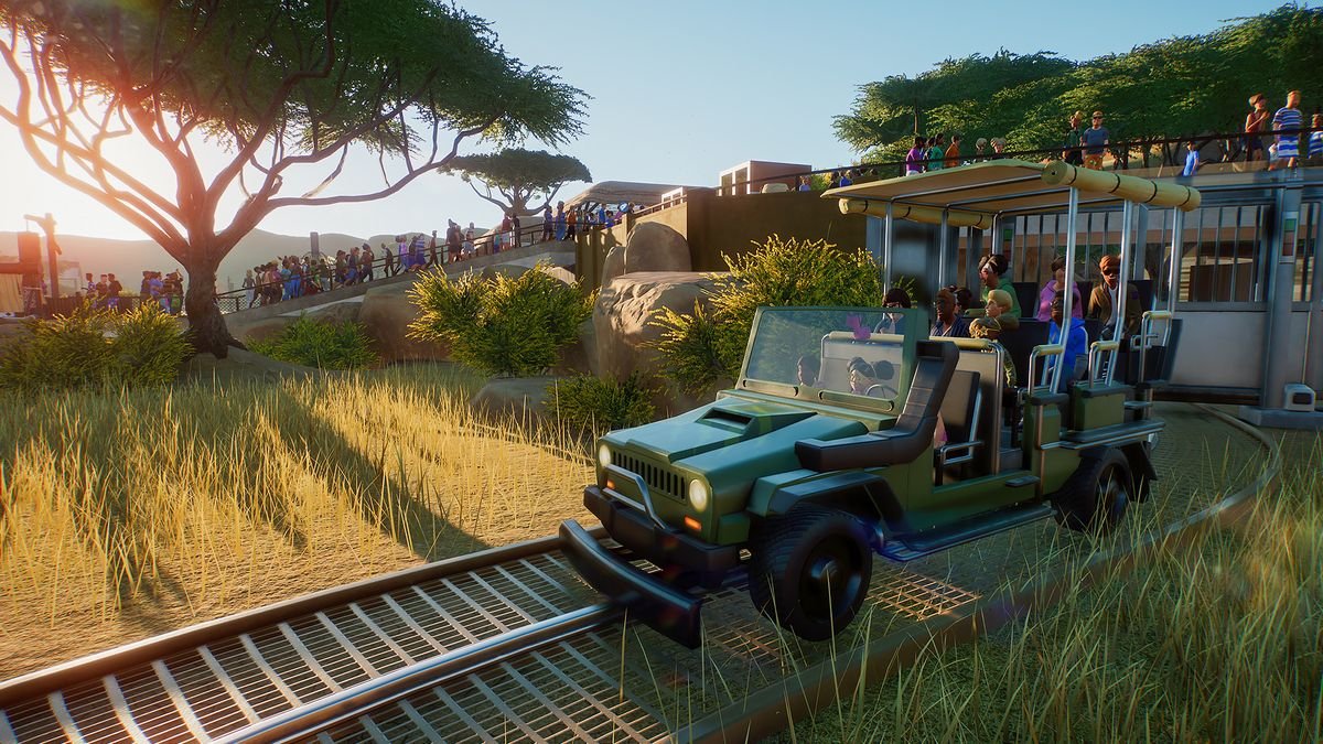 guests taking a jeep ride on rails in Planet Zoo