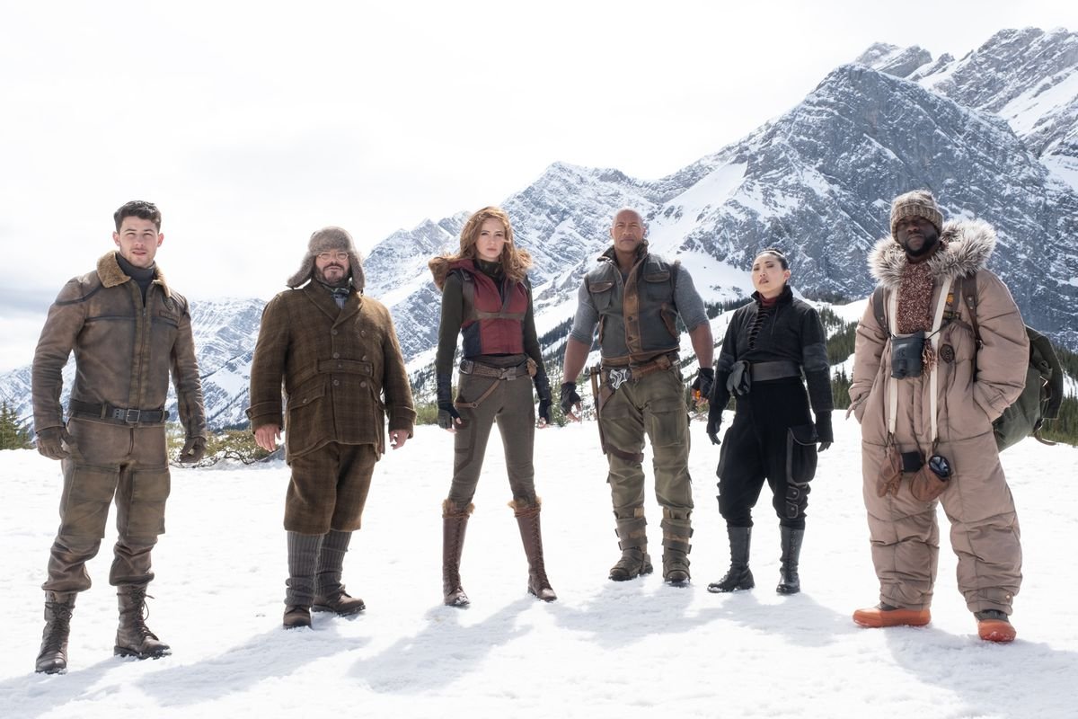 Nick Jonas, Black, Gillan, Johnson, Awkwafina, and Hart in the snow.