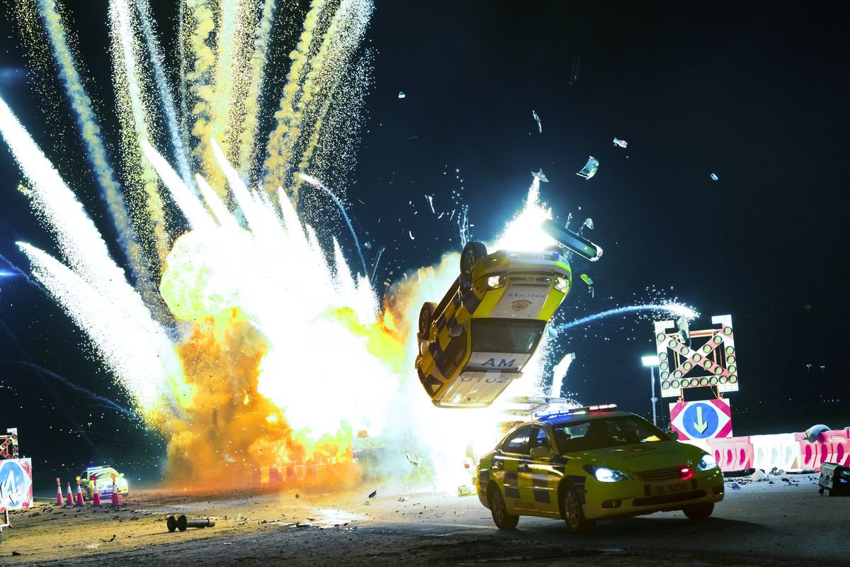 An explosion totals two cars.