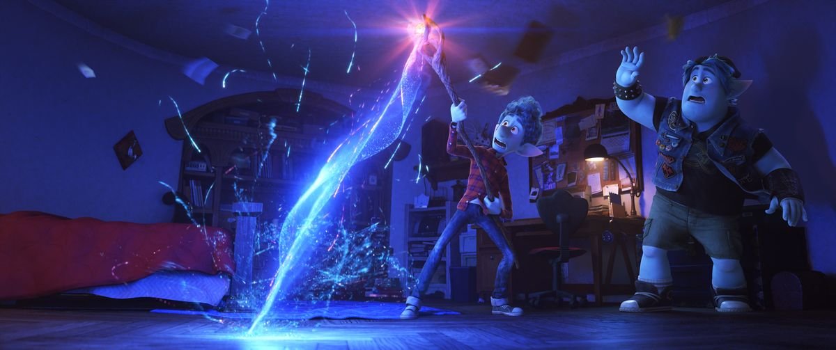 A skinny, blue-skinned animated teenage elf wrestles with a magical that’s shooting a bolt of blue energy into the ground in his room, as his huskier elf brother looks on in surprise in Onward