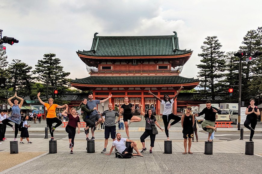 One Life Adventures group tour posing for photos in front of building