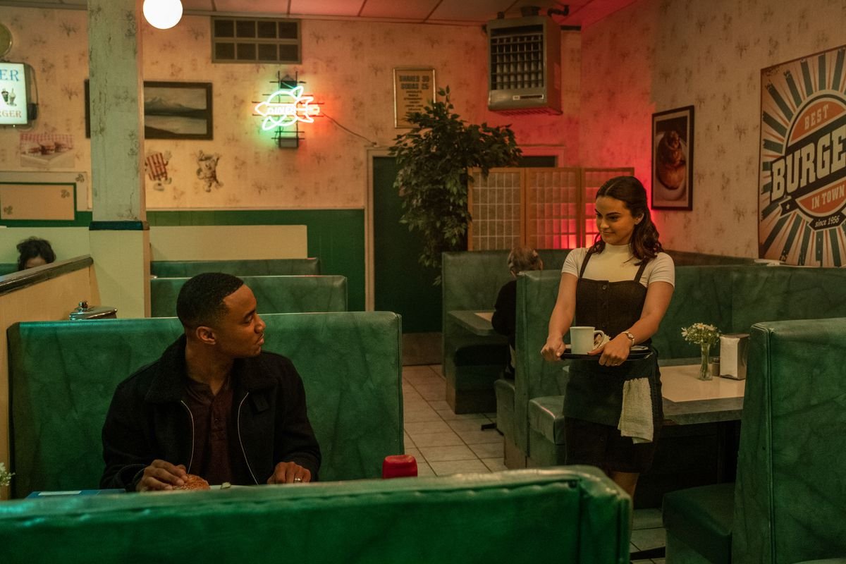 a young couple in a diner