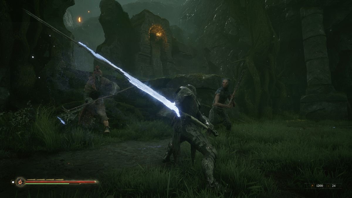 An armored warrior attacks a pair of enemies with a glowing sword