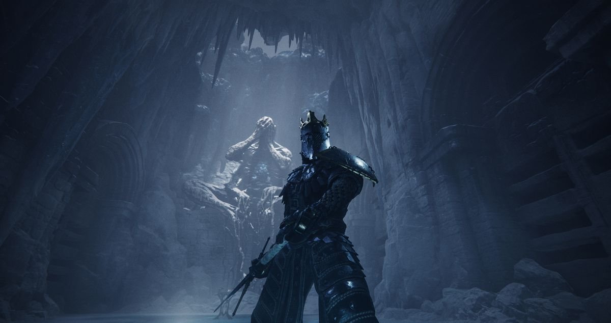 An armored warrior stands before a mysterious statue