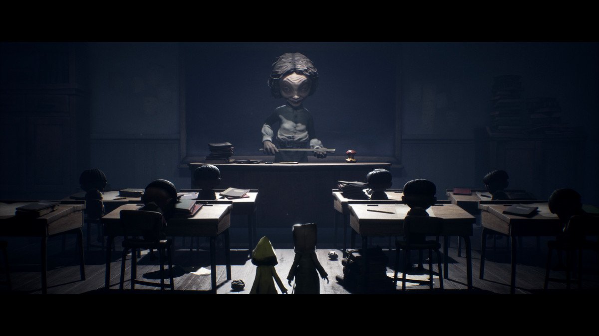 Mono and Six stand in front of the monstrous school teacher in Little Nightmares 2