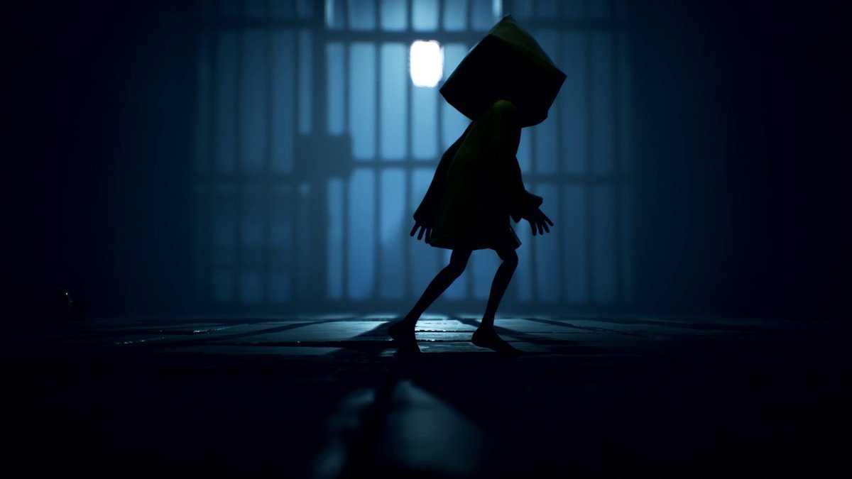 Six sneaks by a barred door in Little Nightmares 2