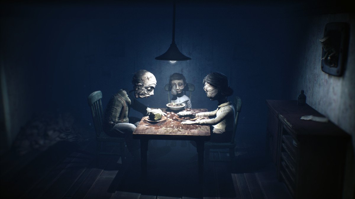 A haunted family sits at dinner in Little Nightmares 2