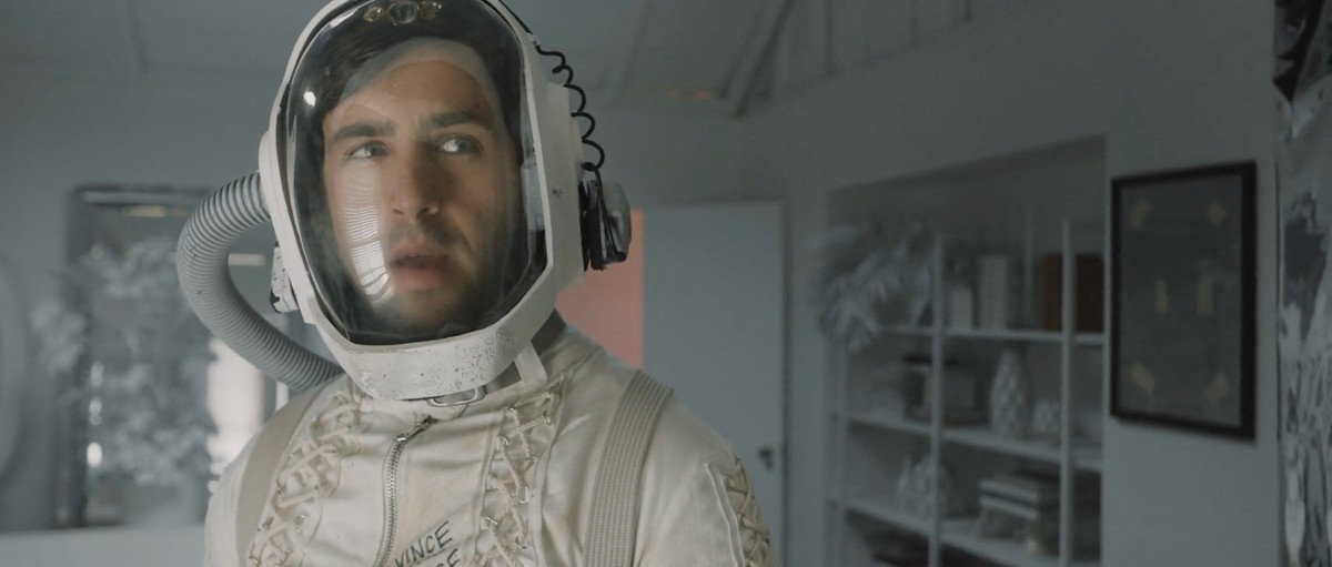 Vlog Squadder Josh Peck looks super dubious in a handmade spacesuit in Doors