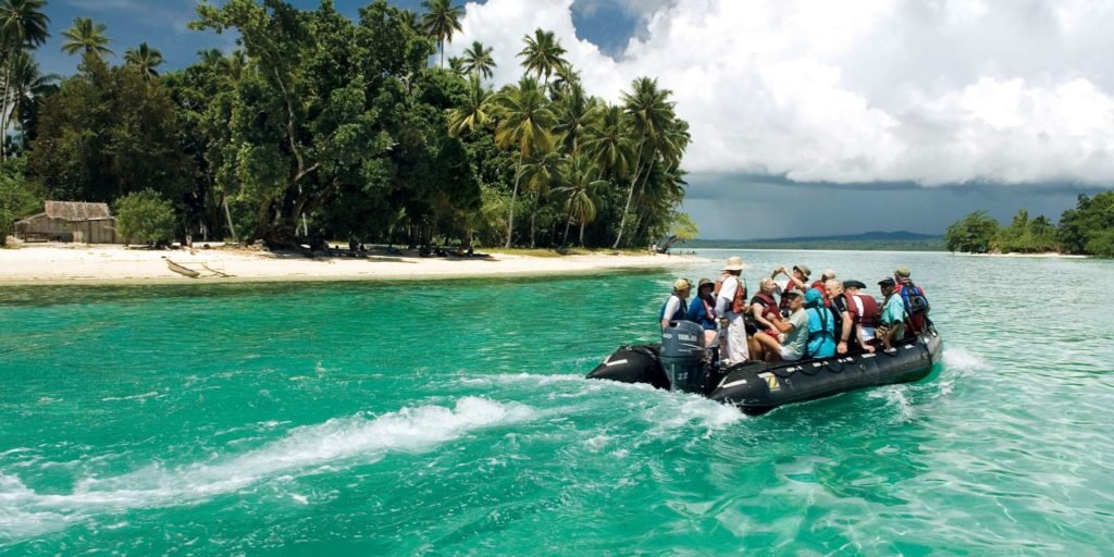 A tour group on a boat with Zegrahm Expeditions