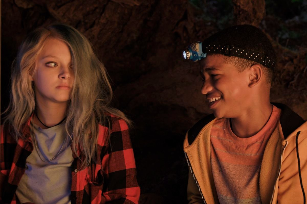 Lonnie Chavis grins at Amiah Miller, who looks doubtful, in The Water Man.