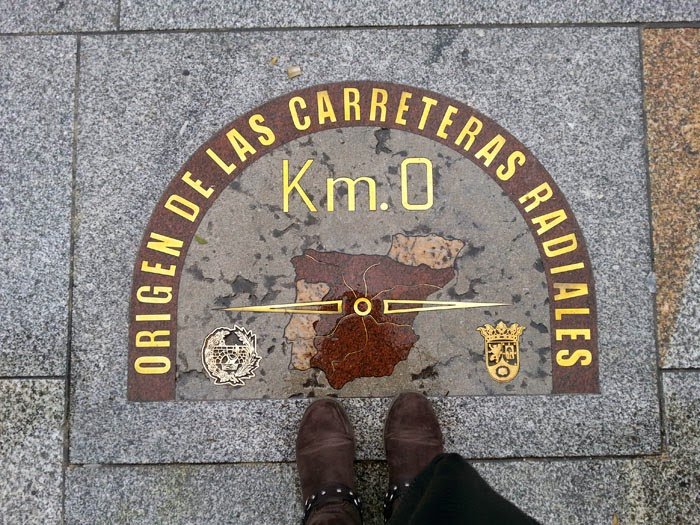 Visiting kilometro cero of Spain, a plaque that signals the start of all roads in Spain, during a weekend in Madrid is a popular activity