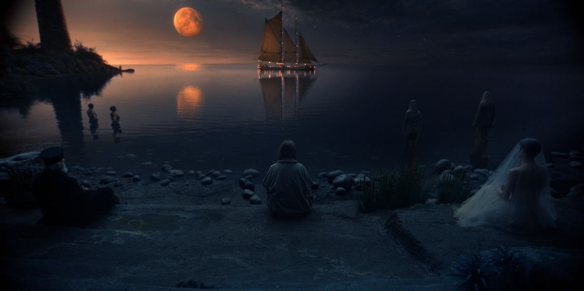 An uncanny magical-realm vista in Lisey’s Story, with a blood moon, a distant ship on the horizon, and a jumbled rock beach