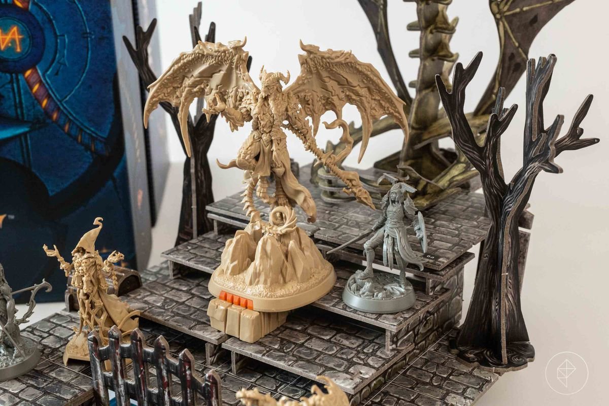 A demons stands on a mountain of flagstones.