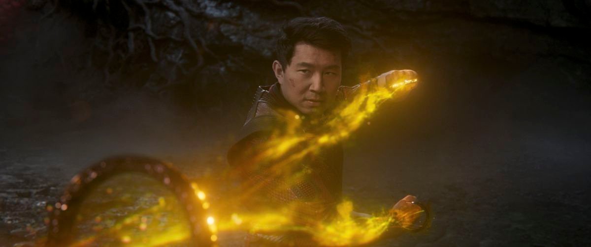 Shang-Chi draws yellow magic power from the ten rings
