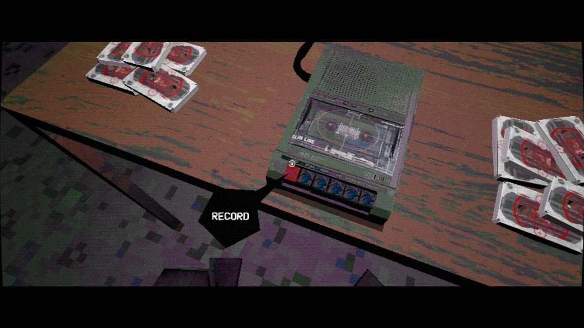 Nightslink - the player prepares to record a cassette in a darkened room