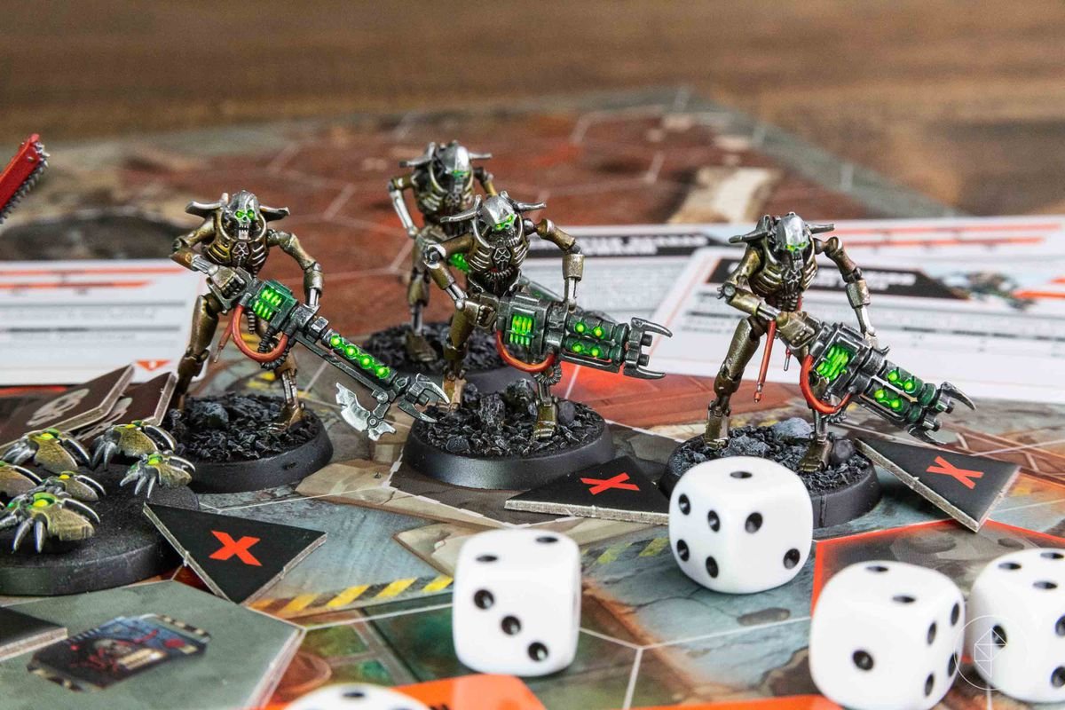 A selection of Necron Warriors, painted a unique gold and chrome coloration.