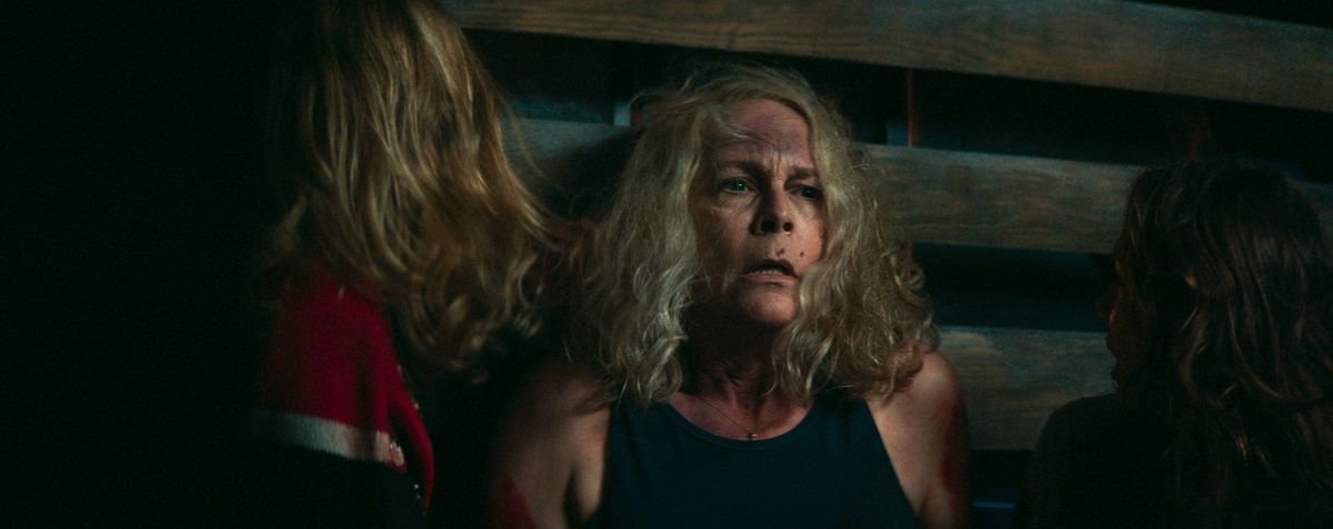 Laurie catches her breath in the back of a truck in Halloween Kills