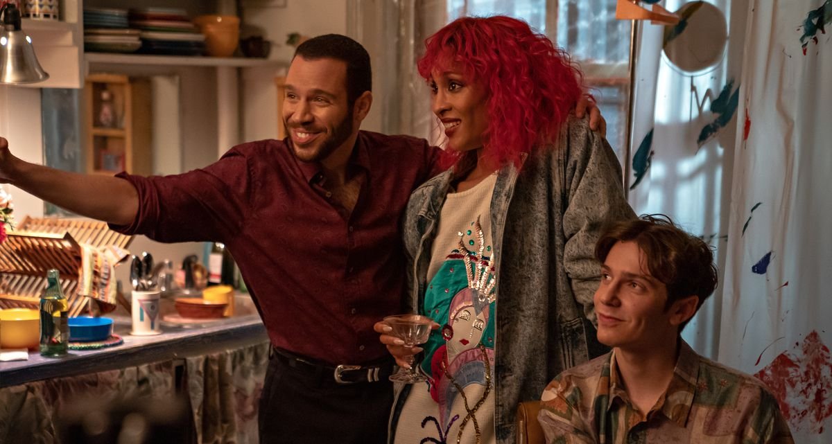 A boho-looking crowd hangs out in Netflix’s Jonathan Larson musical Tick, Tick… Boom!