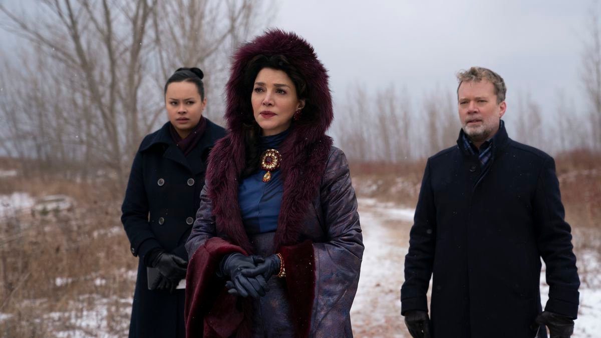 Three characters from The Expanse standing at Earth looking at wreckage (not pictured) from a comet in a still from season 6 of The Expanse