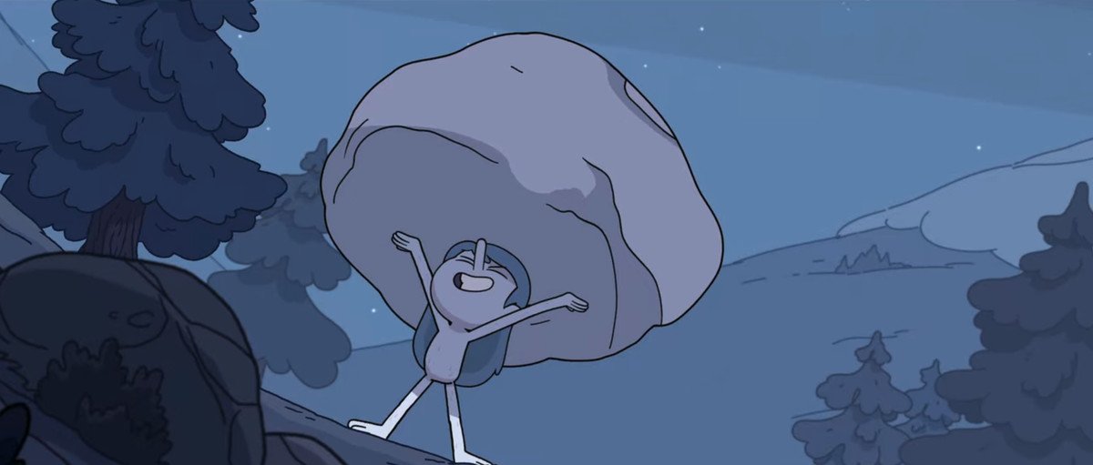 Hilda holding up a large boulder