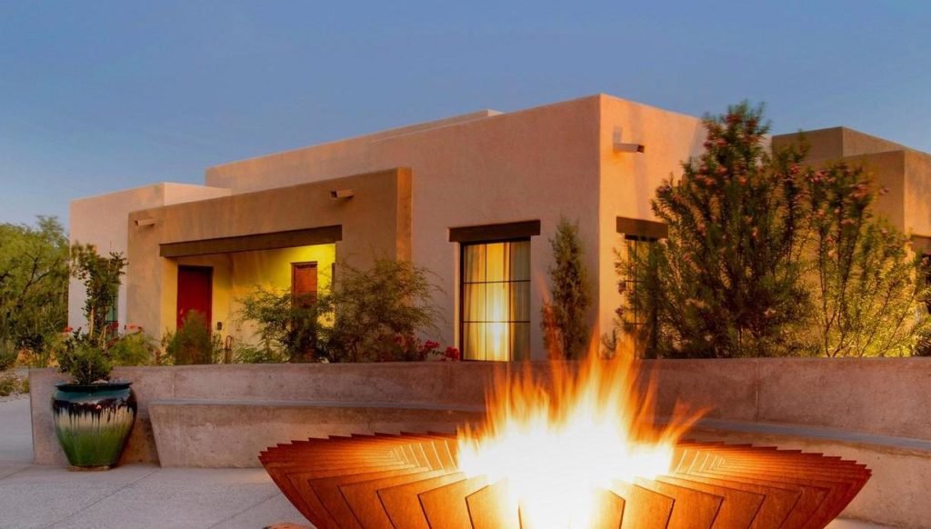 Exterior of a building and fire pit at Canyon Ranch Tucson, Arizona