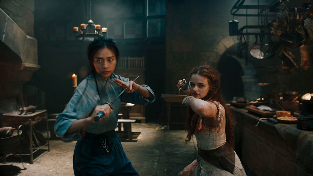 linh and the princess stand side-by-side, wielding swords