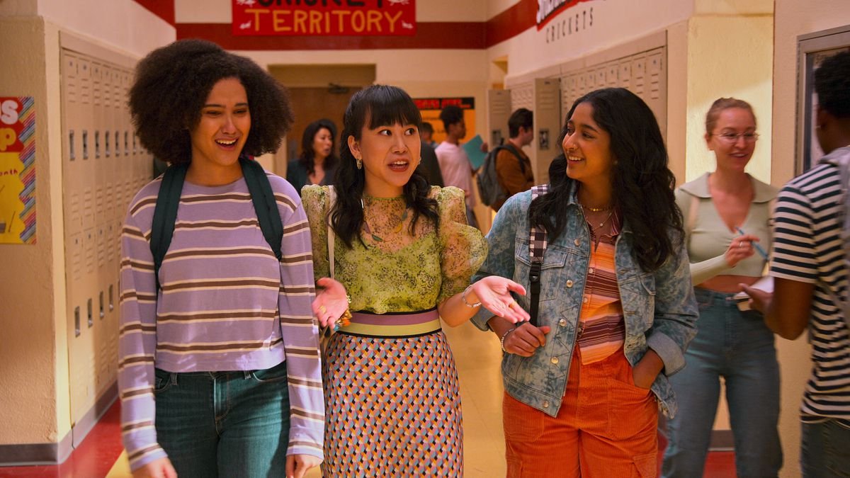 fabiola, eleanor, and devi walking through school