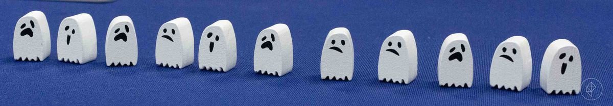 Ghost meeples from Psychic Pizza Deliverers all have different faces.