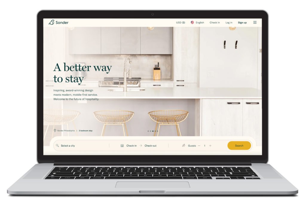 Digital rendering of a laptop showing the homepage of Sonder