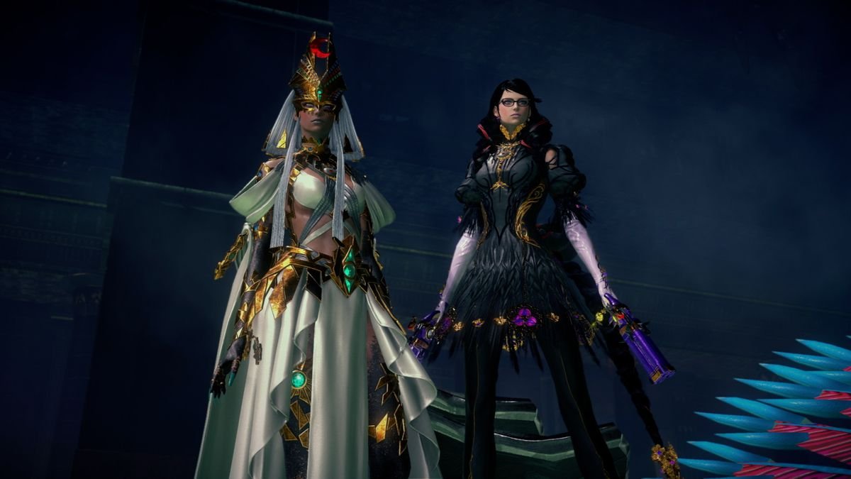 A Bayonetta from another universe (left), wearing an ancient Egyptian-inspired white gown and gold jewelry, stands next to our universe’s Bayonetta (right), wearing all black