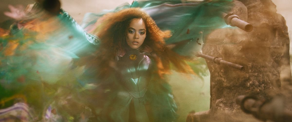 Quintessa Swindell as Cyclone uses her wind powers in a swirl of blurred CGI color in Black Adam