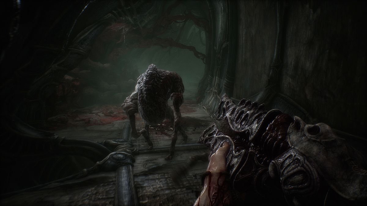 The player character aims the gothic-looking shotgun at a monster approaching them in Scorn