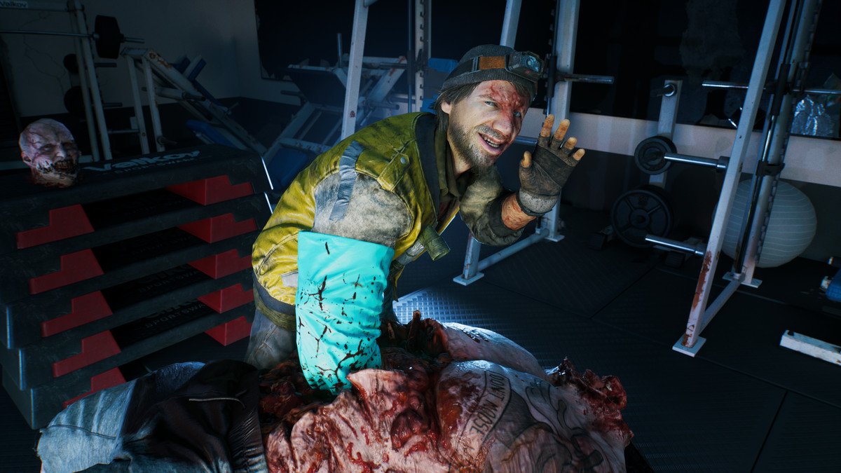 A character reaches his arm into a zombie’s stomach in Dead Island 2