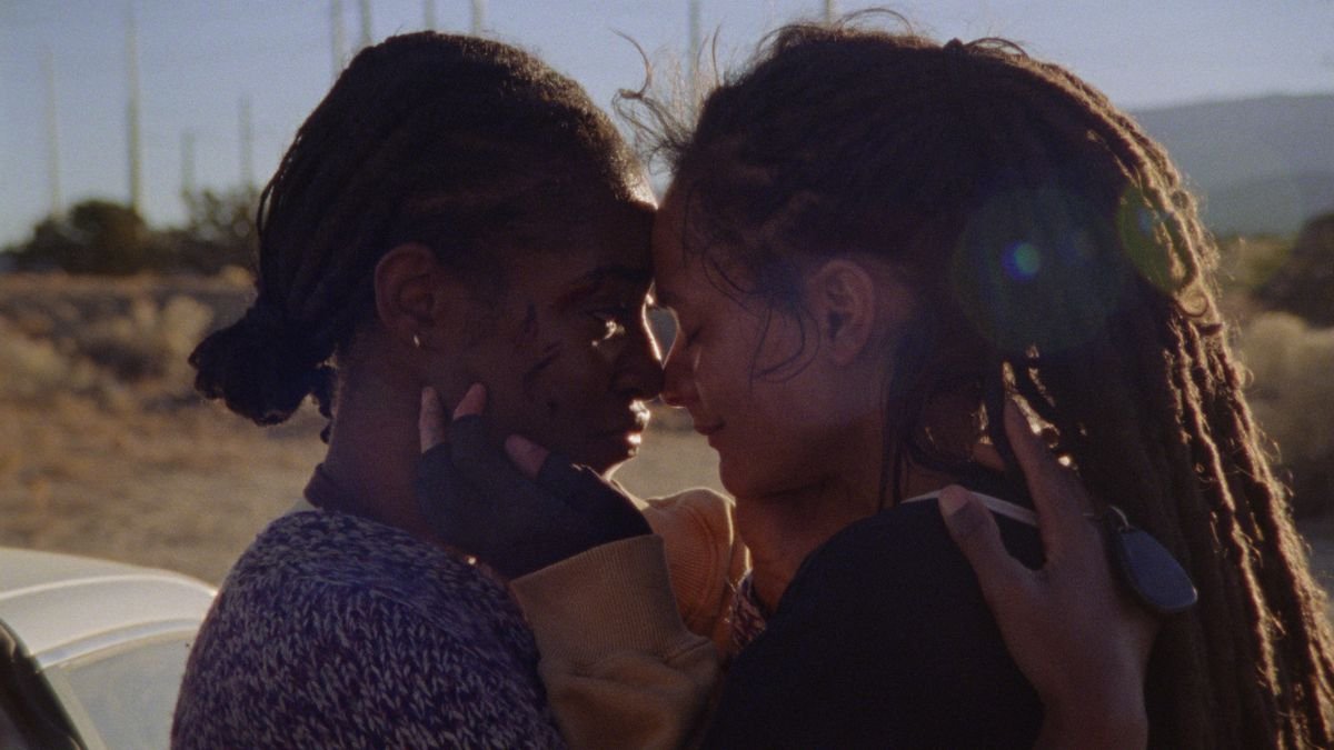 Theo (Sasha Lane) and Alisha (Jayme Lawson) embrace in How to Blow Up a Pipeline.
