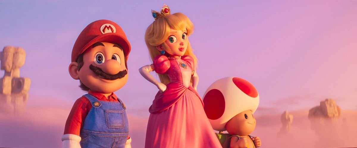 Mario, Peach, and Toad overlook a foggy valley full of sculptures in the Super Mario Bros. Movie