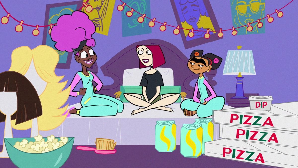 Harriet, Joan, and Frida sit on a bed crisscross with popcorn, soda, and pizza boxes in the foreground