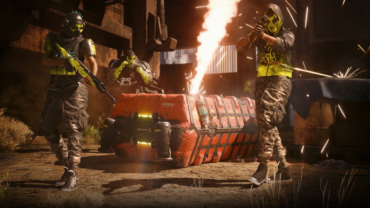 a supply drop — a large red armored crate — with sparks and smoke flying upward from it, surrounded by three armed men wearing black and neon yellow outfits, in a screenshot from Cyberpunk 2077: Phantom Liberty