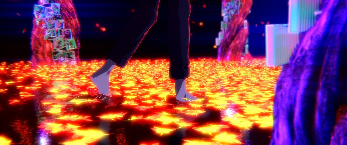 Someone walking through a glowing river of fallen autumn leaves